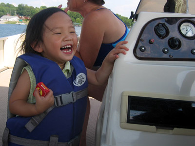 Eating raisins and honking the boat's horn. What a wonderful ride!